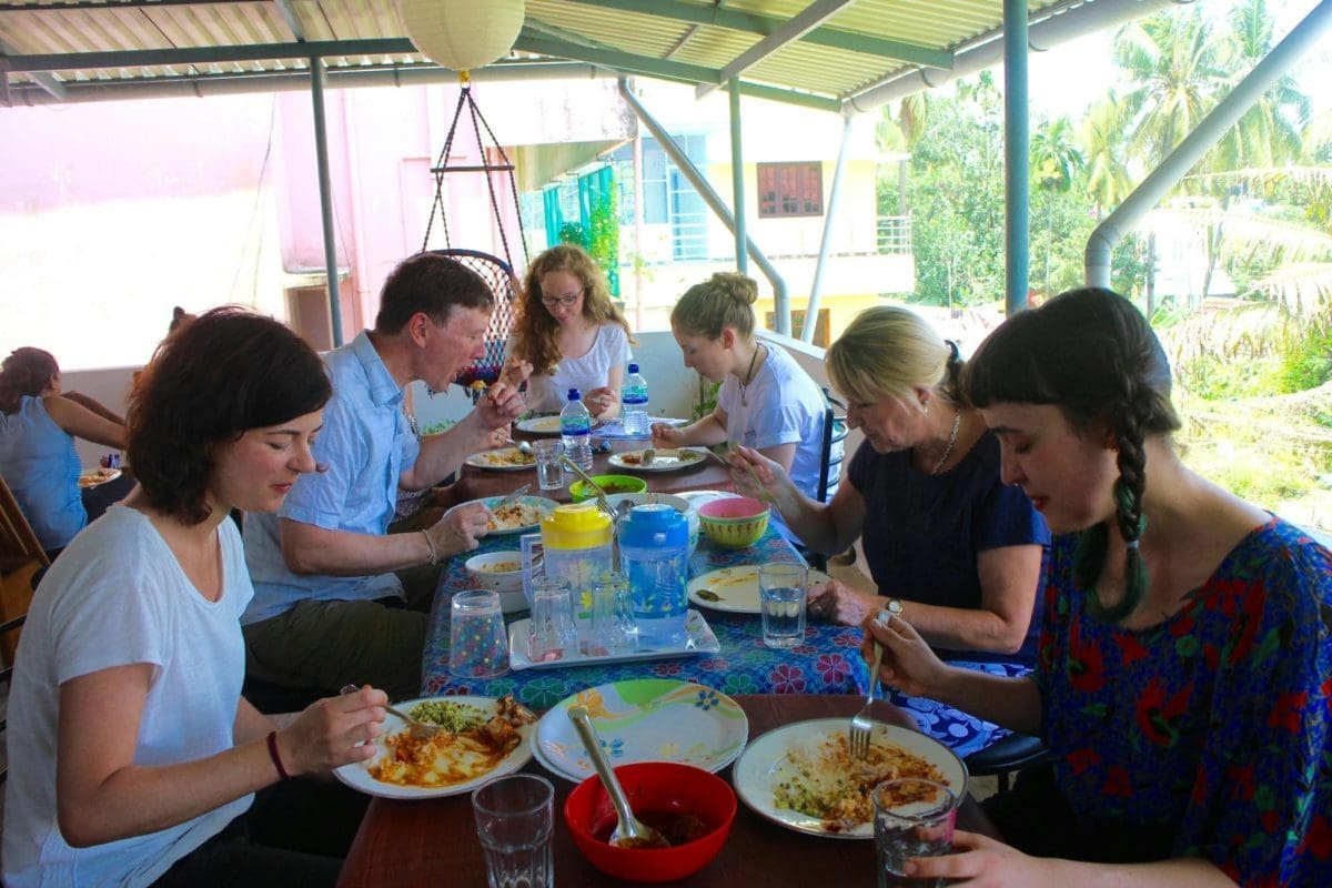 Family Enjoying lunch at the volunteer house in India