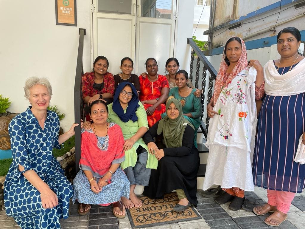 VOLUNTEERS WITH EMBROIDERY STUDENTS